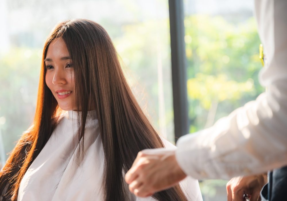 woman-with-long-hair-getting-haircut-in-salon-2026-01-09-07-30-59-utc-scaled.jpg
